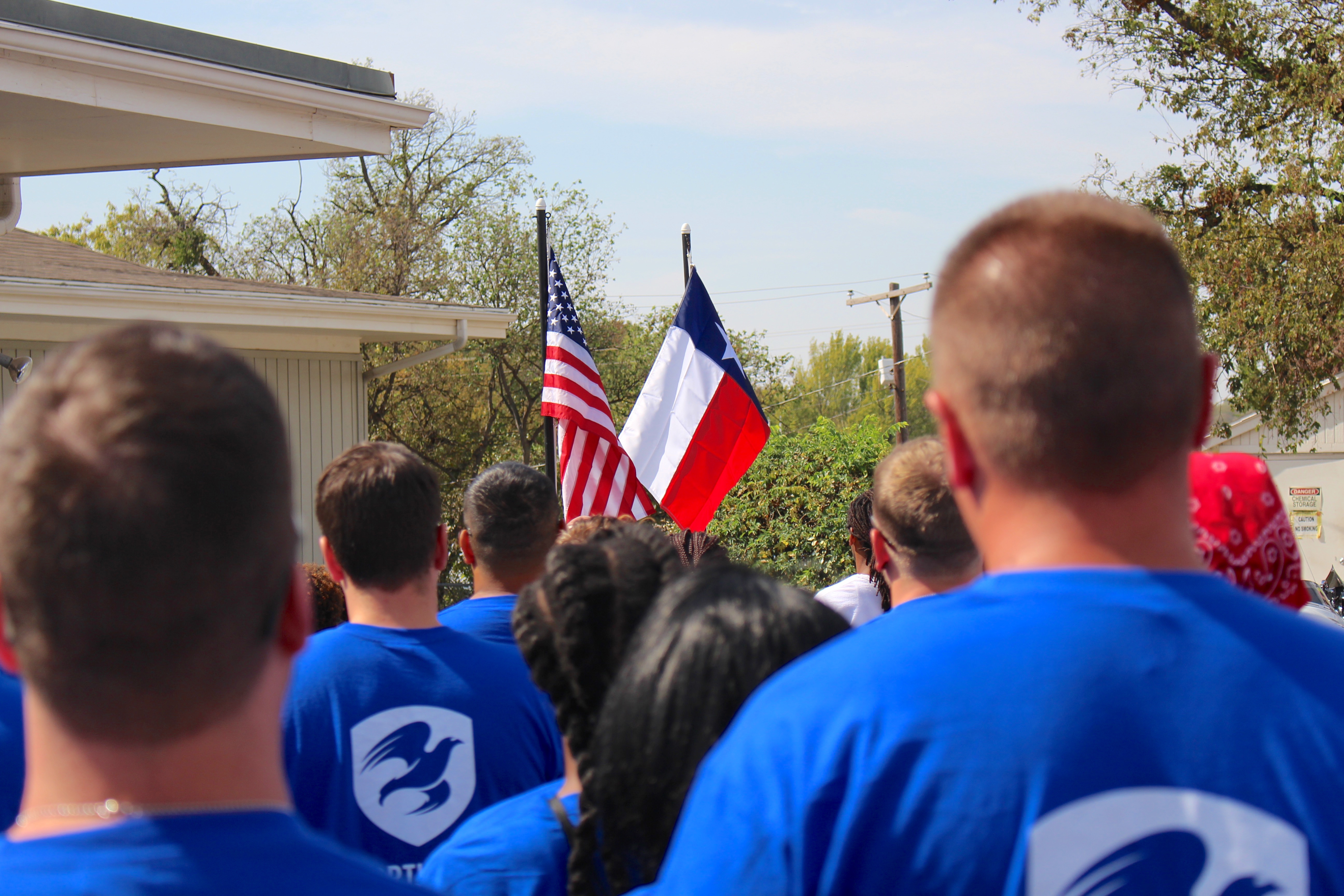Delta Class 2015 pauses for the national anthem.